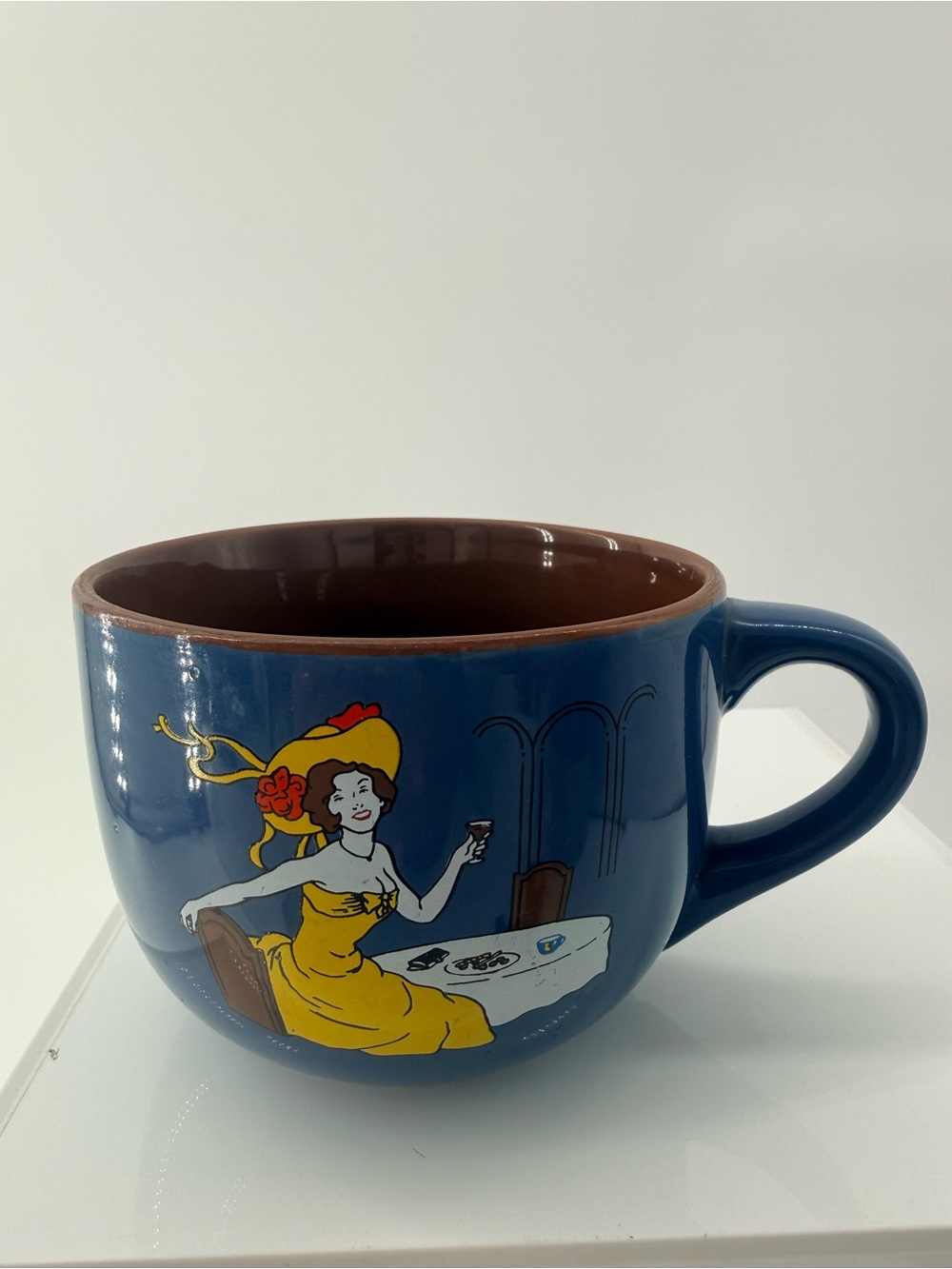 Blue Ceramic Mug with Yellow Lady Illustration